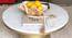 Russel Round Solid Wood Coffee Table (Gold Finish) by Urban Ladder - Front View Design 1 - 574952