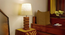 Libra Brown Wooden Table Lamp with White Fabric Lampshade (Brown) by Urban Ladder - Rear View Design 1 - 907159
