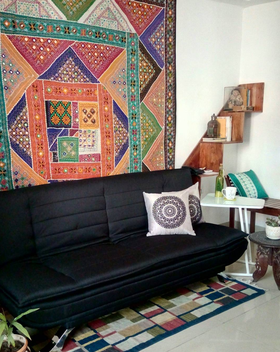 A start to my long time wish to having a Bohemian room. The black Edo sofa perfectly compliment the backdrop of colour riot along with the Jony laptop table and medalian cushions. Thanks to Urban Ladder for the smooth transaction once again!