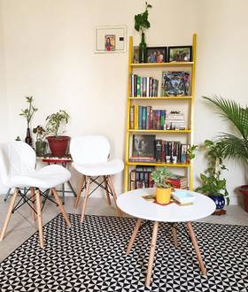 Here’s the other side of our living room. Just how beautiful are these chairs from Urban Ladder and now they are in MY house and I’m in love with them...seriously...even though maintaining the white in dusty Gurgaon is a nightmare and then I went ahead n ordered the matching white table !!! Oh well...the heart wants what it wants. I love how the furniture contrasts with the fab carpet ! Exactly what we had in mind when we started off ! Our place of happy