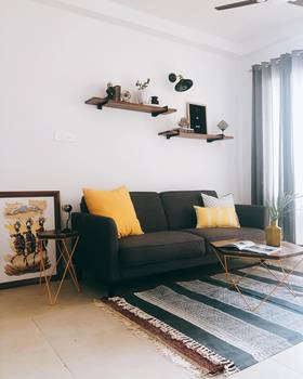 Friday throwback to the bachelor pad! Sofa Bed, Coffee - Side Table Set along with the wall shelves brings up the mood here  !! :)